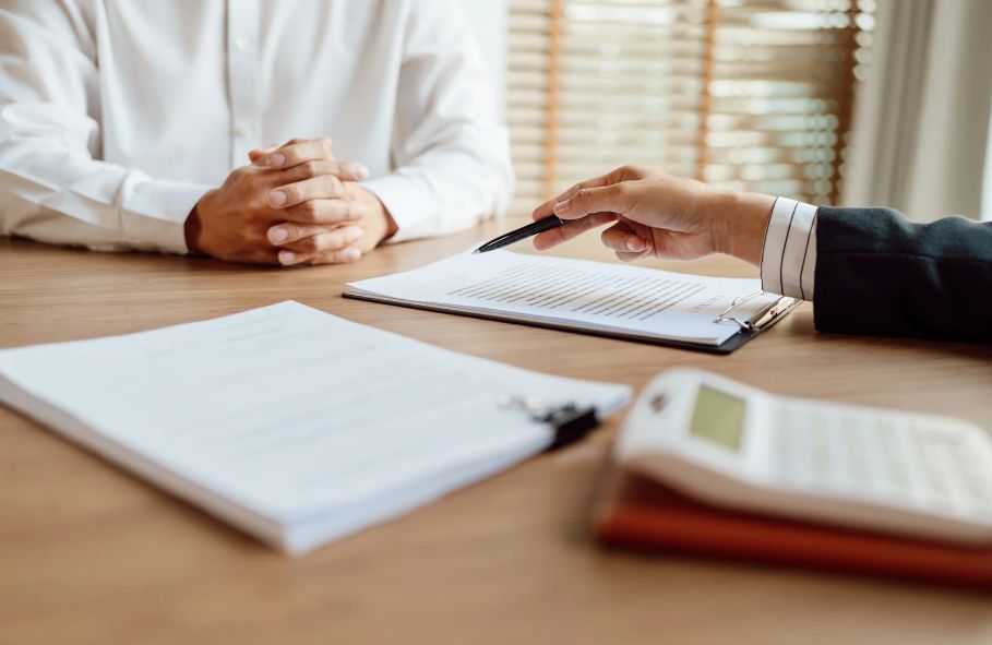 Two persons meeting about insurance. 